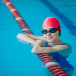 Woman professional swimmer in swimming pool