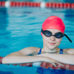 Woman professional swimmer in swimming pool